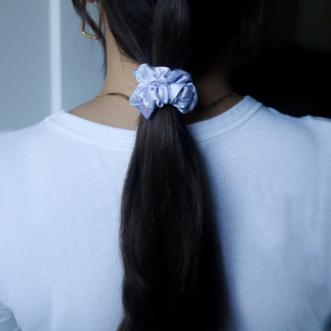 ￼Model wearing medium sized silk scrunchie 